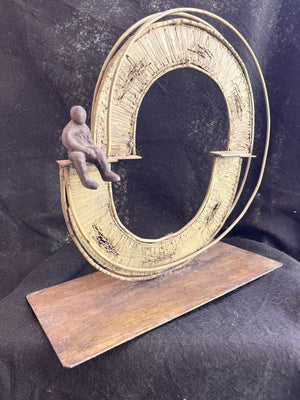 Escultura en Metal " El Hombre y el mundo"